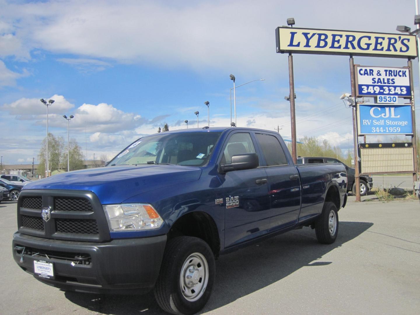 2016 blue /gray RAM 2500 Tradesman Crew Cab 4WD (3C6TR5HTXGG) with an 5.7L V8 OHV 16V engine, automatic transmission, located at 9530 Old Seward Highway, Anchorage, AK, 99515, (907) 349-3343, 61.134140, -149.865570 - Low miles in this Ram 2500 come take a test drive - Photo#0